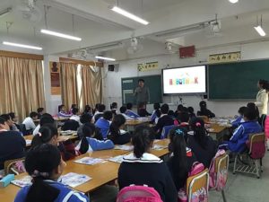 Kids learning in classroom with RoboThink presentation